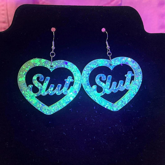UV yellow glow glitter dangle drop clip on bitch or slut earrings
