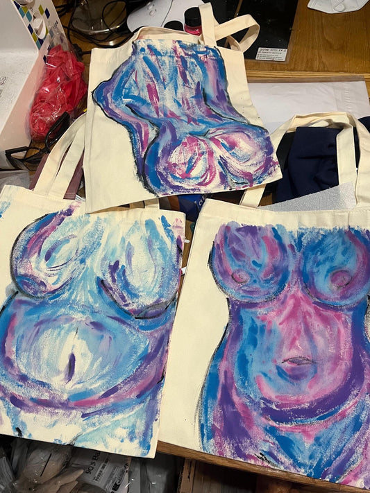 Nude hand painted shopping tote bags in blue pink and purple