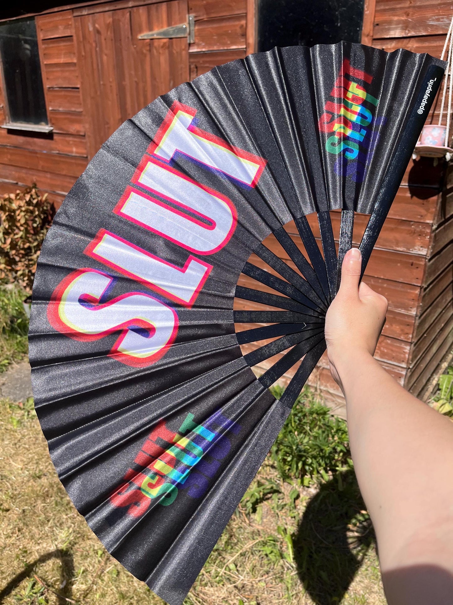 Huge colourful clacker fan for raving, pride, or fanning yourself whilst you have a panic attack