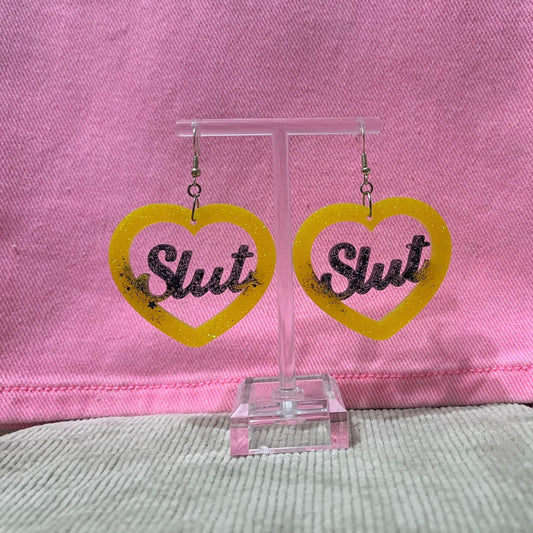 Black and Yellow glitter dangle drop clip on bitch or slut earrings